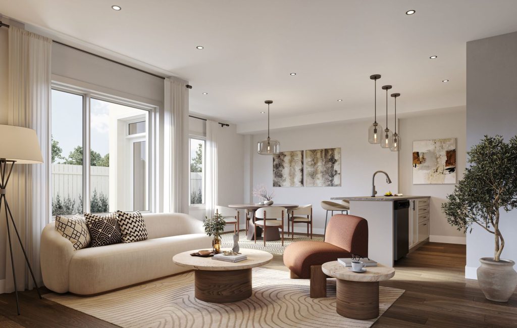 The Perfect Townhome: living room open to the kitchen, with a curved sofa and tall windows