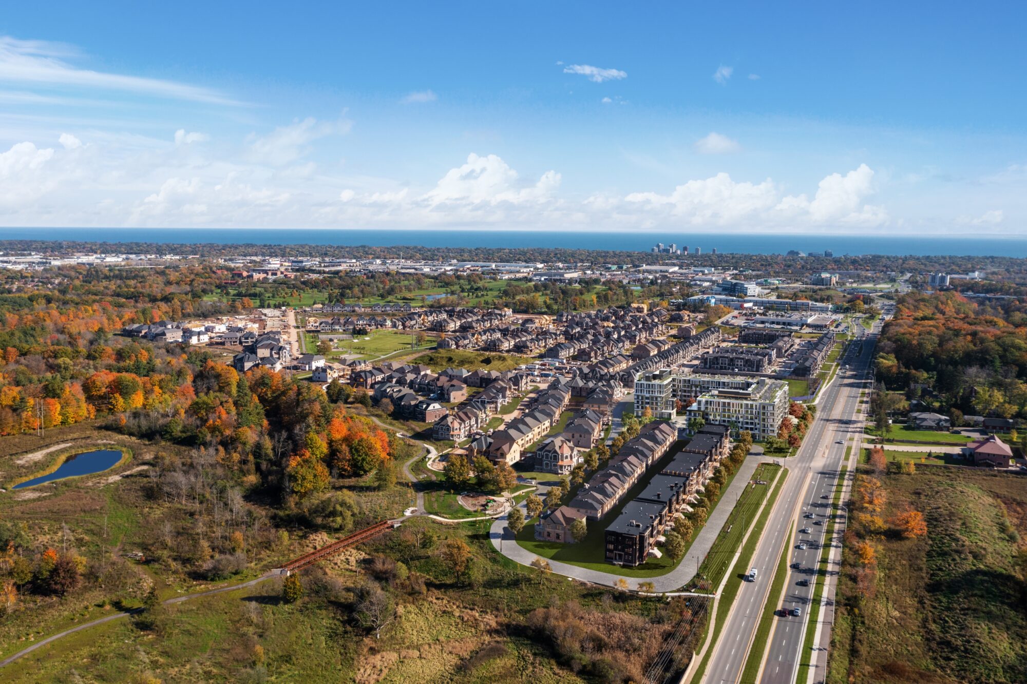 Aerial view over Bronte Creek in autumn, with the surrounding Oakville neighbourhoods