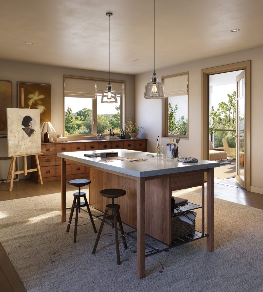 Riverview artist's loft with a work island, stools and an easel