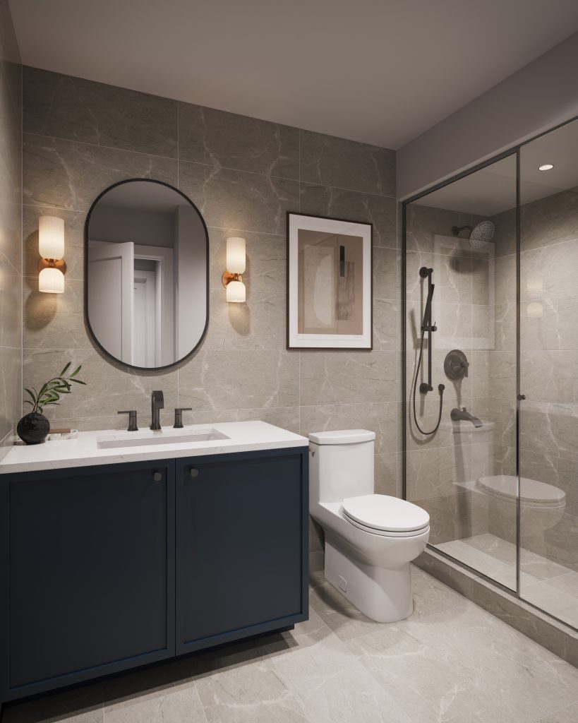 Aura ensuite with a glass shower, navy vanity and oval mirror