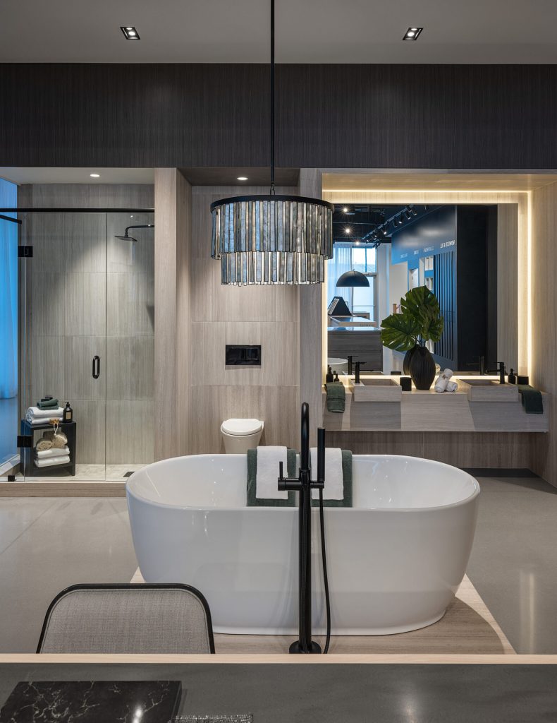 Bathroom vignette in the Design Studio, with a freestanding tub and glass shower