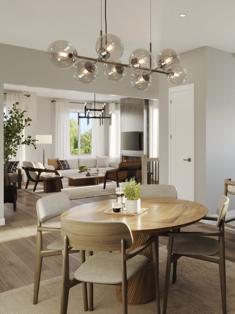 Cassette dining area open to the living room, with a round table and globe chandelier