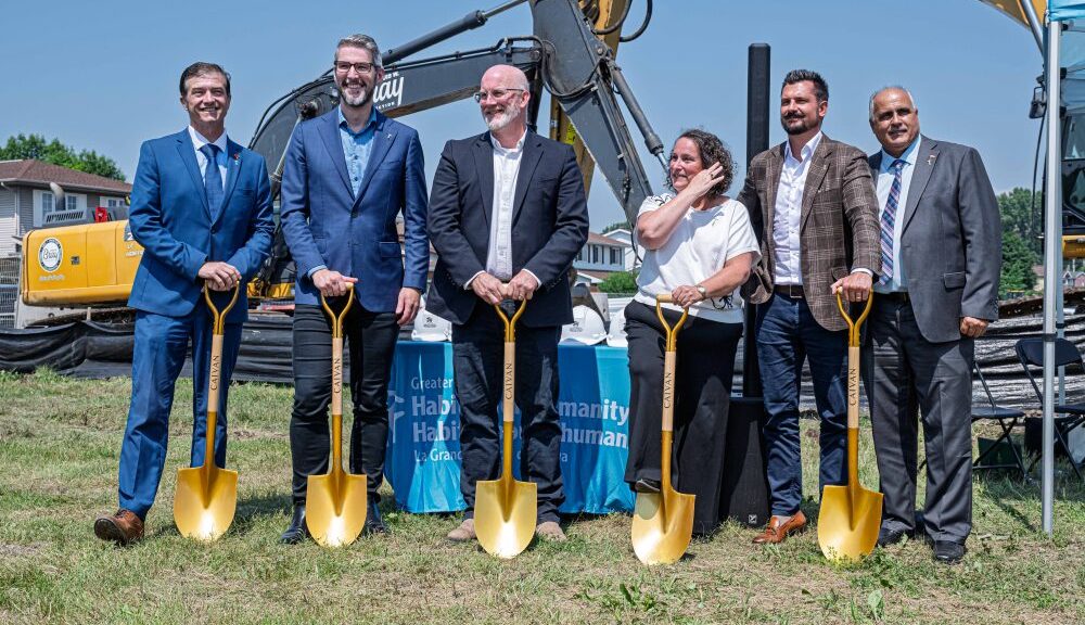 Six people with ceremonial shovels at the Beechcliffe Homes groundbreaking