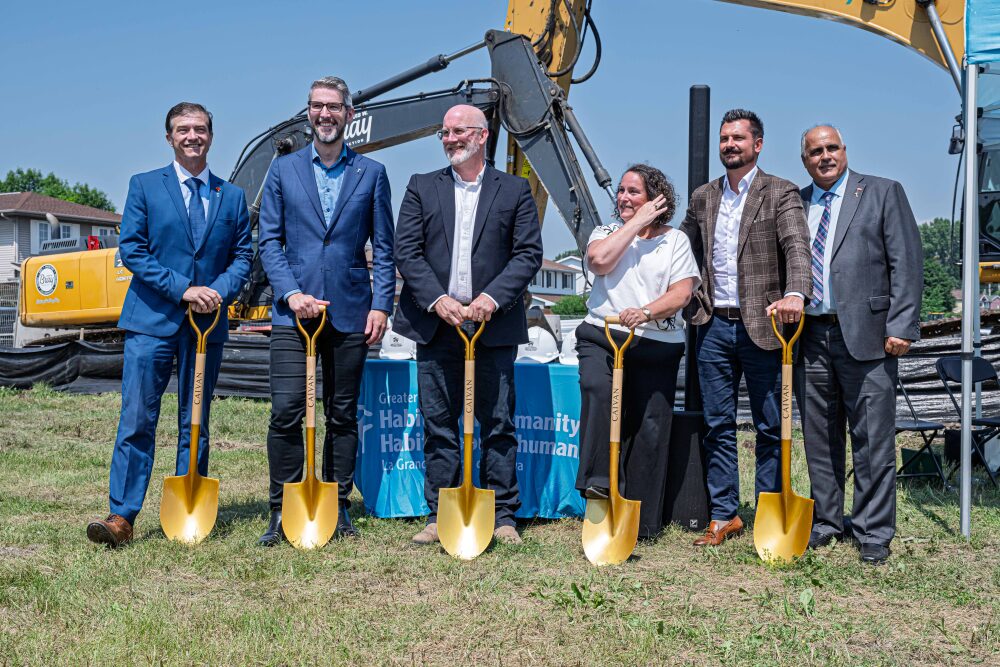 Six people with ceremonial shovels at the Beechcliffe Homes groundbreaking