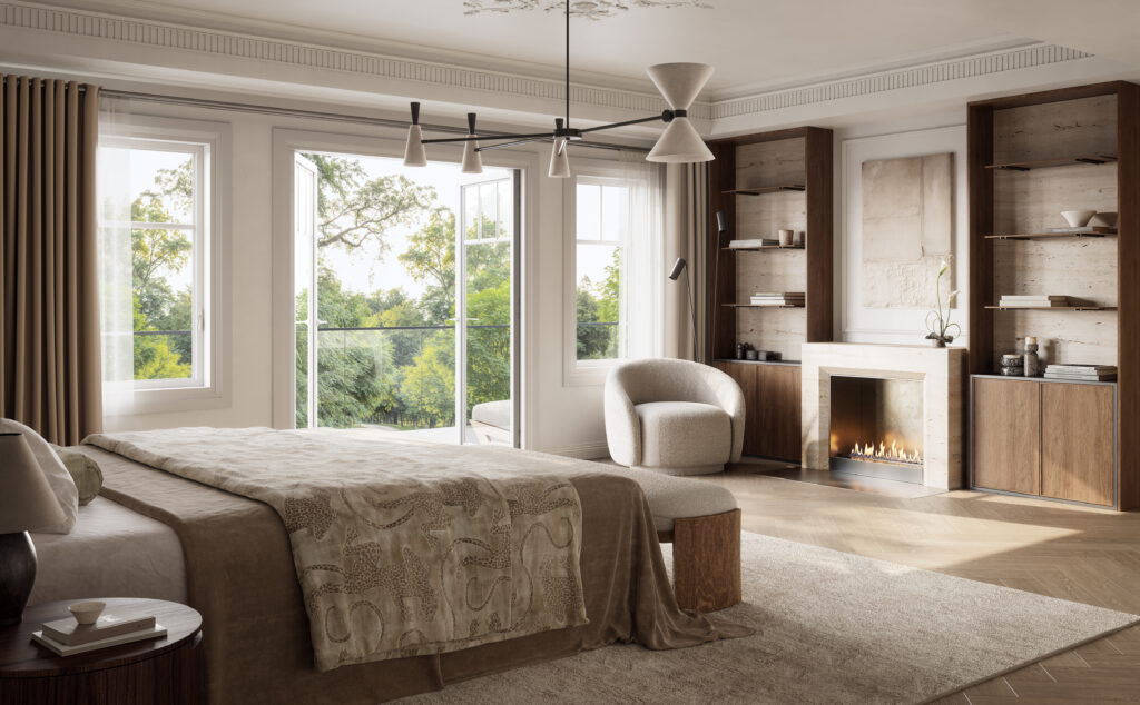 Primary bedroom at Five Oaks, with a fireplace, built-in shelving and a bay window