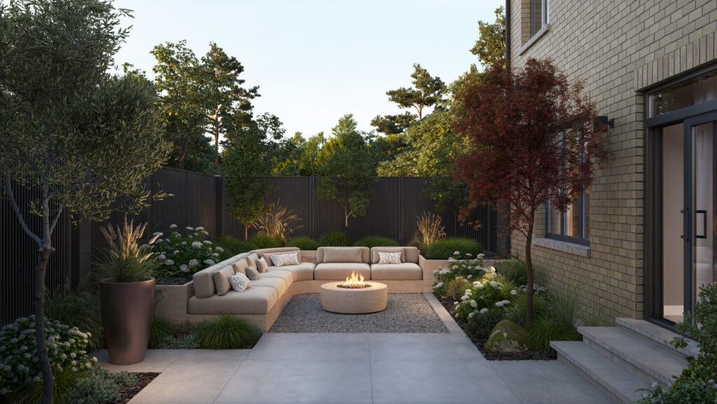 Backyard at Five Oaks, with built-in outdoor seating around a fire table and planted borders